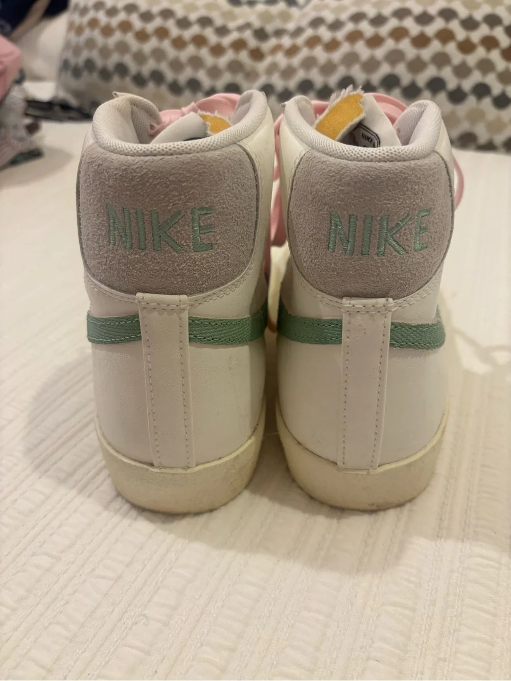 Nike Women’s White High-Top Lace-Up Boots with Pink Laces and Green Swoosh